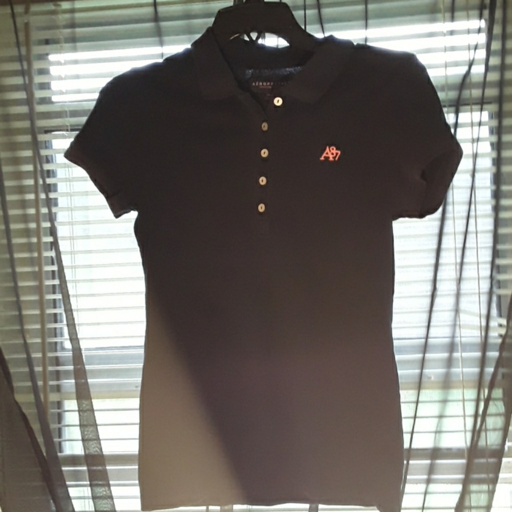 A navy blue collared shirt